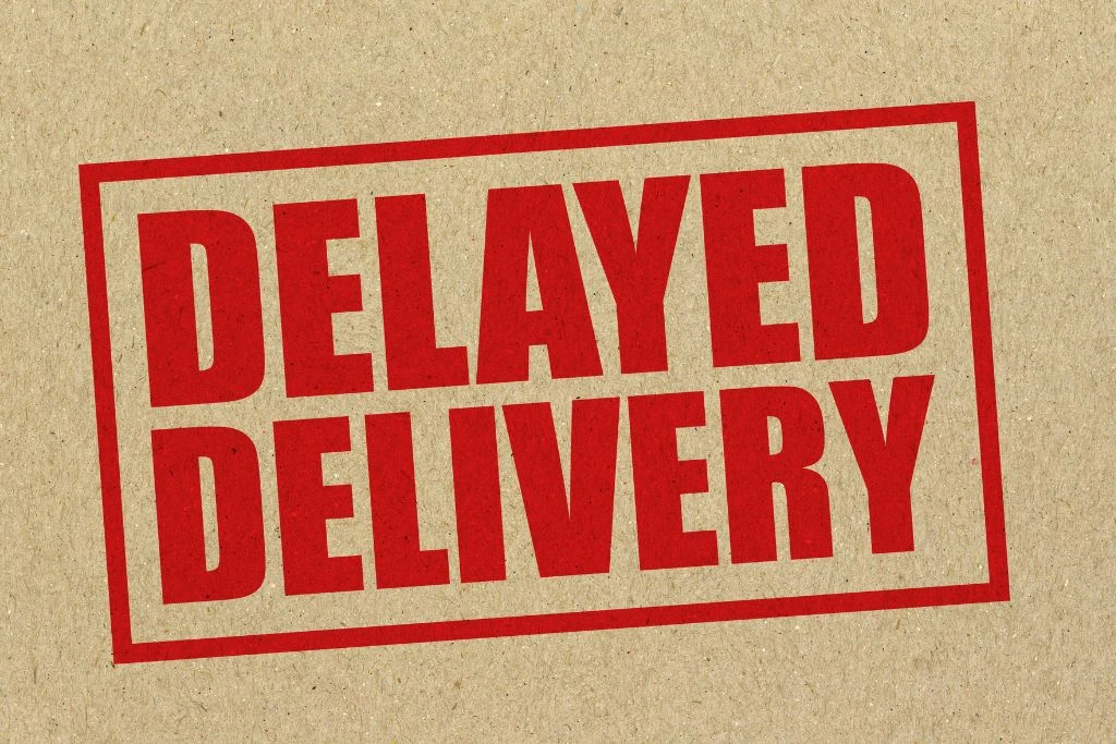 Delayed delivery stamp on a box
