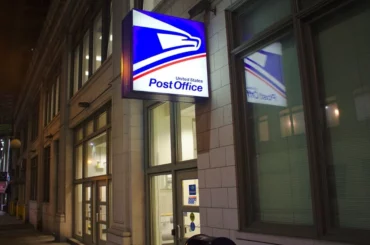 USPS office sign on budling
